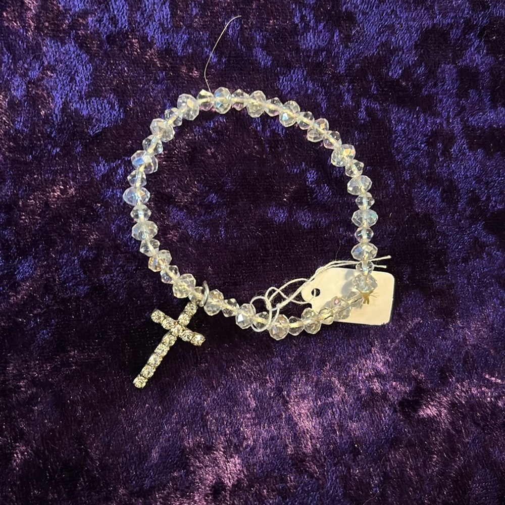 Clear stone bracelet with cross  pendant